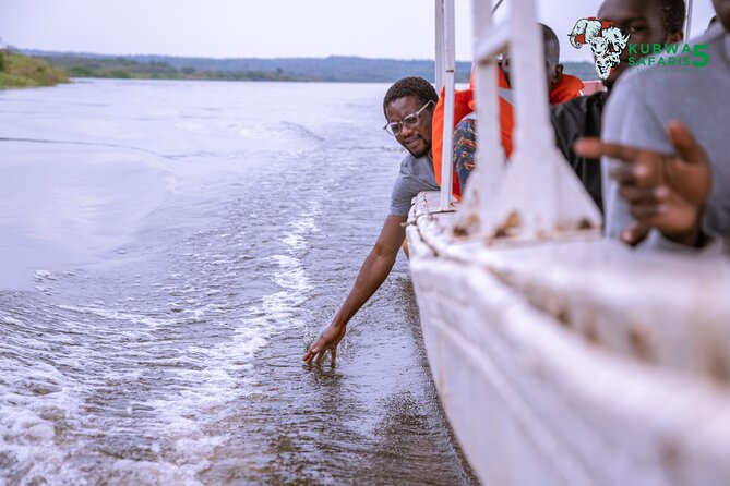 3 Days Wild Tour Queen Elizabeth National Park Safari Uganda - The return to Kampala and the Equator stop at Kayabwe