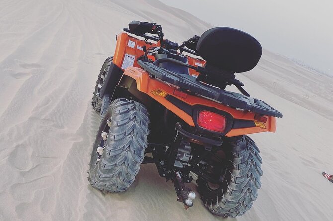 4 Hour Desert Safari, Camel Ride & Inland Sea Beach - Sandboarding on the soft slopes