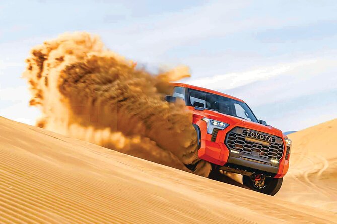 4 Hour Morning Desert Safari with Camel Ride & Sand Boarding - Leaving Dubai in an air-conditioned 4WD