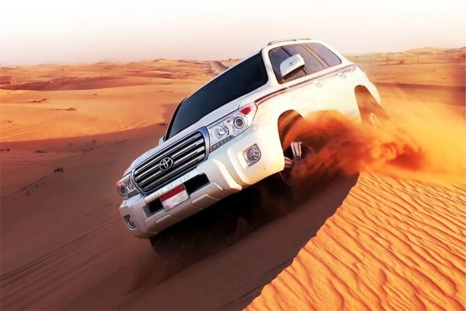 6-Hour Dubai Desert Dinner Safari with Dune Bashing & Camel Ride - Quad biking and sandboarding on the dunes