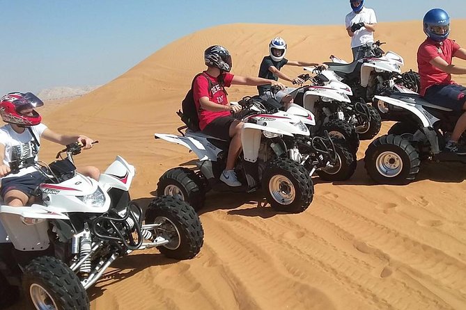 6-Hour Dubai Desert Safari with BBQ Dinner & Quad Biking - Tanoura, belly dance, and fire show