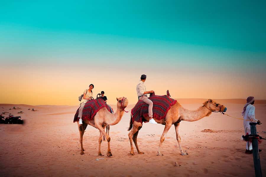 Abu Dhabi: Desert Safari with BBQ, Belly & Tannura Dance - Sandboarding and the short camel ride
