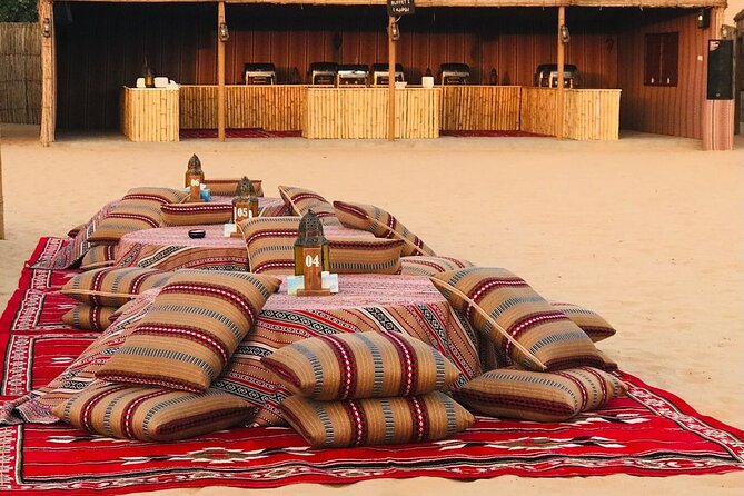 Abu Dhabi Desert safari with BBQ Dinner,Sandboarding & Camel ride - Sandboarding for a quick burst of fun