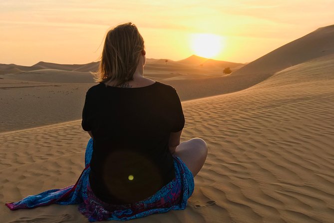 Abu Dhabi Desert safari with BBQ Dinner,Sandboarding & Camel ride - A camel farm and a brief ride