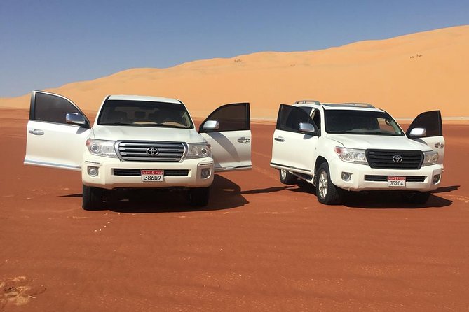 Abu Dhabi Desert Safari with BBQ Dinner & Shows - Red dunes and the best sunset pause