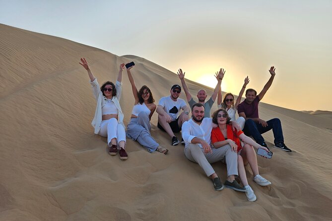 Abu Dhabi Desert Safari With Live Shows And BBQ Buffet Dinner - Dinner, drinks, and the evening camp