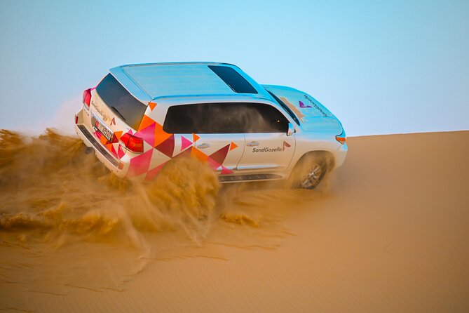 Abu Dhabi Evening Desert Safari - Private car Dune bashing & BBQ - Camel farm visit and a closer look at desert animals