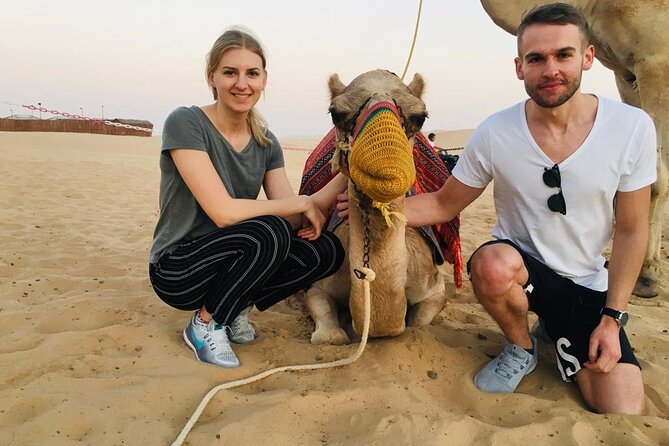 Abu Dhabi Full-Day Desert Safari - Henna, Arabic clothing, and falcon photographs