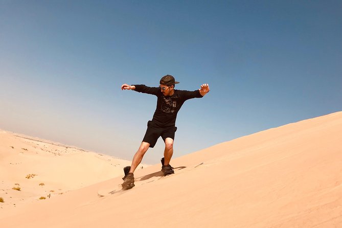 Abu Dhabi Morning Desert Safari,Dune Bashing,Sandboarding,Camel Riding&Quad Bike - The camp stop brings four short activities together