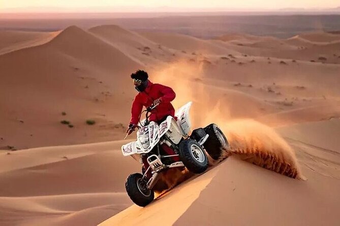 Adventurous Red Dune Desert Safari Deal with Quad Bike,Shows &BBQ - Live shows from belly dance to fire performance