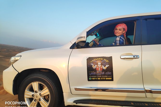 Afternoon Dune Drive Safari with SunSet Photo & Sand Boarding - Camel photos, not a long camel trek