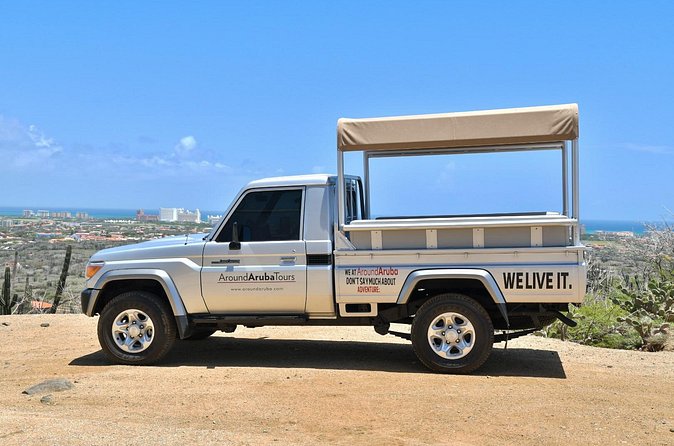 Aruba Outback Safari Jeep Tour - Lighthouse, Arikok & Conchi Pool - Natural Bridge, Tripod Bridge, and Black Stone Beach