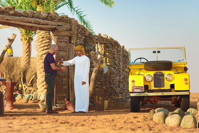 Authentic Safari in Vintage Land Rover with Traditional Dinner - Entering the torch-lit Bedouin camp
