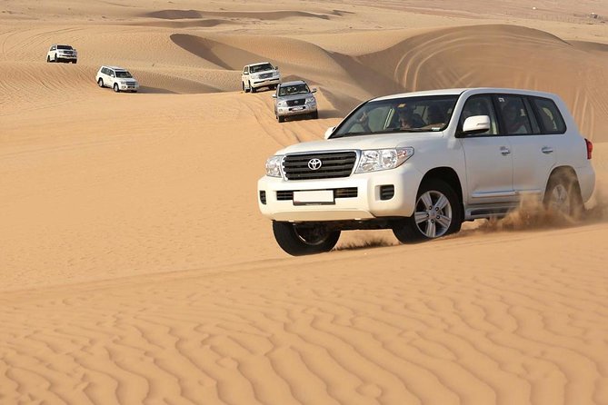 Best Dubai Desert Safari with Buffet Dinner,Sand Boarding & Shows - Quad biking: check the riding area before paying