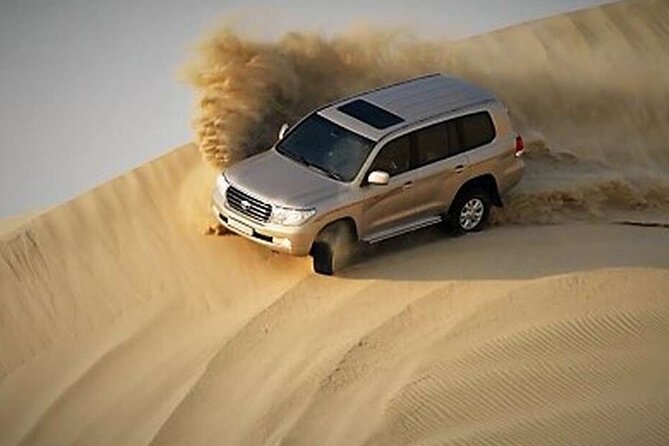 Desert Safari, Camel ride and Inland Sea Tour - Dune bashing across Qatar’s open sand