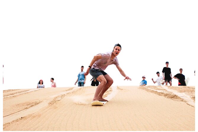 Desert Safari Combo: Camel Ride, Sandboarding & Inland Sea Visit - A short camel ride at the desert gate