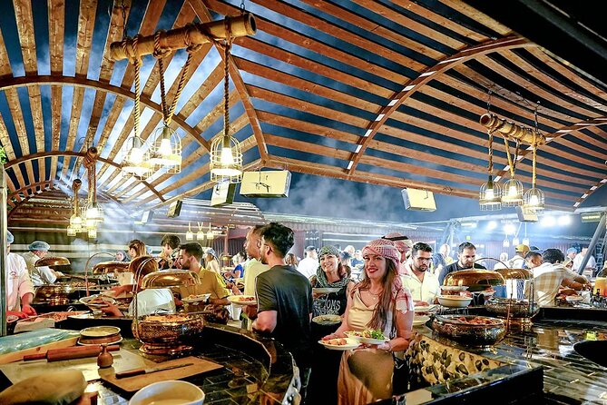 Desert Safari Dubai Sand Bashing, Camel Ride, Shows, Live BBQ - Arabic clothing, tea, coffee, and camp hospitality