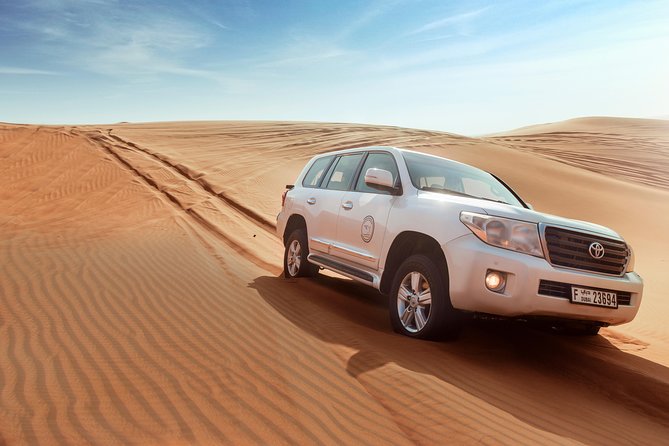 Desert Safari Dubai with Dune Bashing, Sandboarding, Camel Ride, 5 Shows, Dinner - Four or five shows? Check the wording