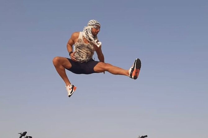 Desert safari in Dubai With BBQ Buffet Dinner Live Entertainments - Henna, Arabic clothing, and the camp setting