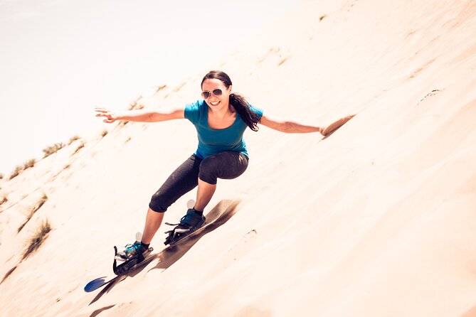 Desert Safari, Open Desert Quad Bike Experience with BBQ Dinner - Sandboarding and a short camel ride
