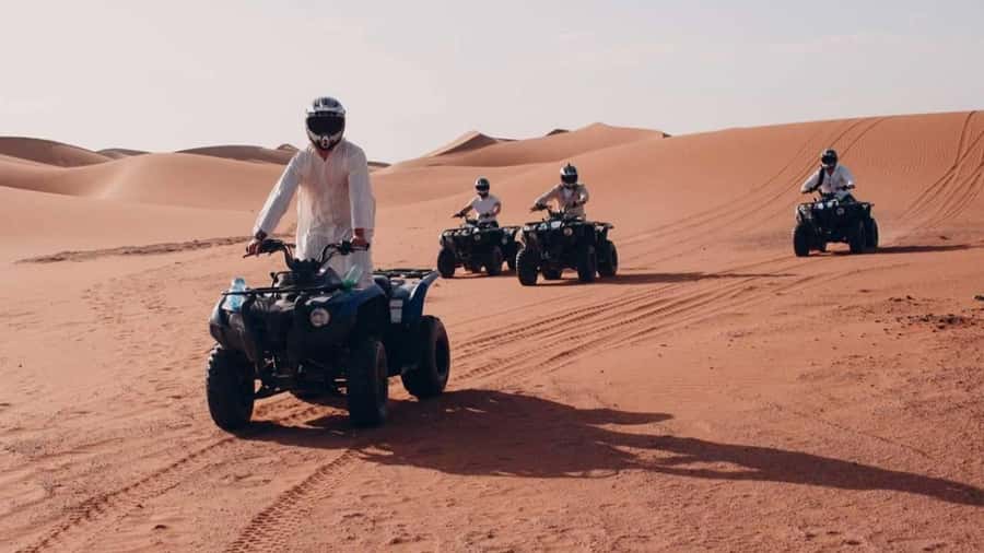 Desert Safari, Quad Bike, Camel Ride, Falcon & Sandboarding - Deflating the tires before dune bashing