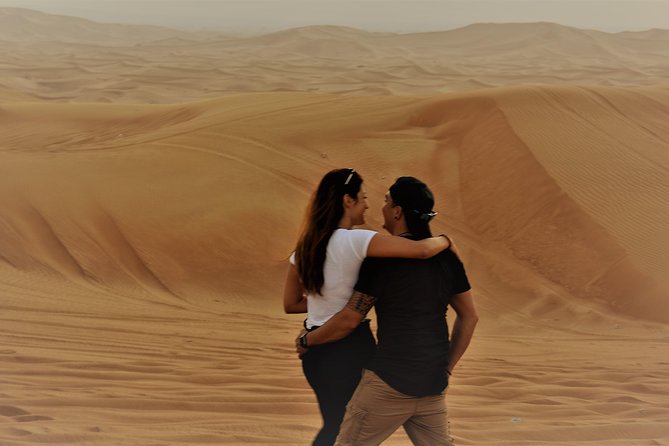 Desert Safari Tour, Quad Bike with BBQ Dinner & Show from Dubai - Sandboarding offers more freedom than the camel ride