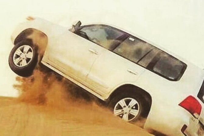 Desert Safari With BBQ Dinner, Quad Bike & Camel Ride from Dubai - Dune bashing across the afternoon sand