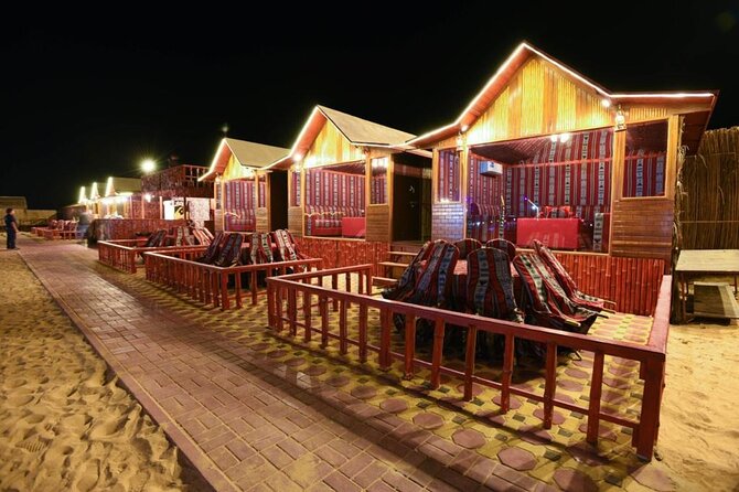 Desert Safari With BBQ Dinner, Quad Bike & Camel Ride from Dubai - Dinner on carpets, cushions, and a busy evening program