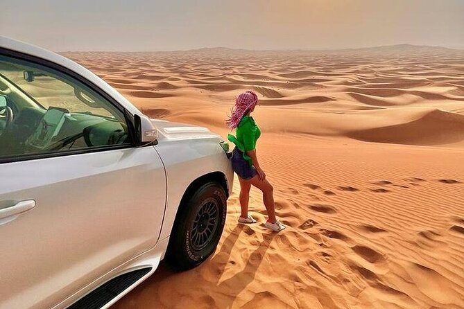 Desert Safari with Quad Bike Camel ride ,SandBoarding ,InalndSea - The 20-minute quad bike session