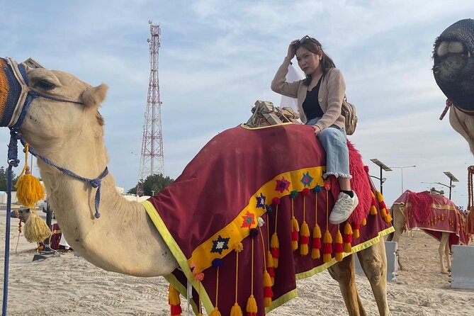 Doha Desert Safari Camel Ride Dune Bashing and ATV Bike - Camel riding for a slower desert view