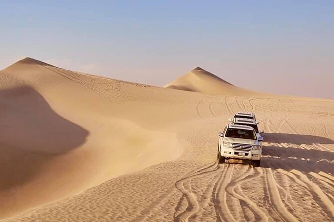 Doha: Desert Safari | Camel ride | Sand-boarding | Quad Biking - Camel riding and the tyre stop