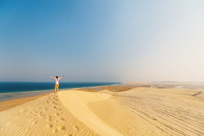 Doha Desert Safari Camel Ride, Sandboarding and Inland Sea - Dune bashing in a 4x4
