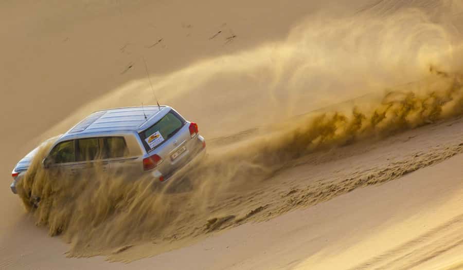 Doha; Desert safari, camel ride, sandboarding, Inland Sea - Three photo stops and a guide who takes the picture