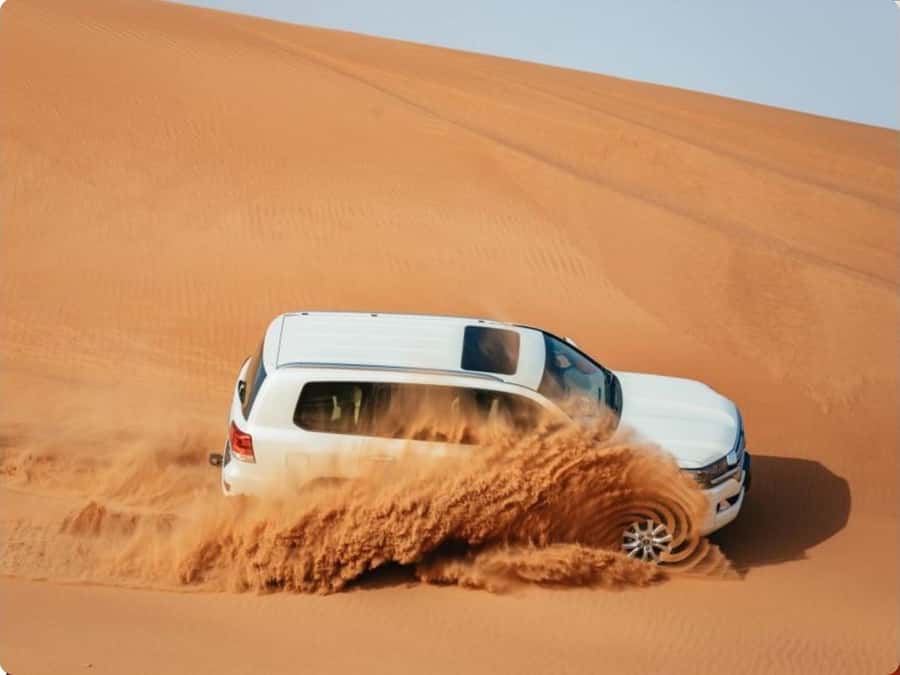 Doha:Desert Safari with Camel Ride, ATV Bike,& Sand Boarding - Taking control on the self-guided ATV