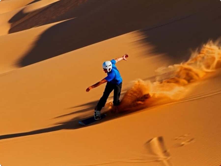 Doha:Desert Safari with Camel Ride, ATV Bike,& Sand Boarding - Dune bashing with a professional driver