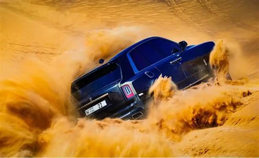 Doha: DesertSafari with Quad Bike, Camel Ride & Sandboarding - Dune bashing in a professional 4x4