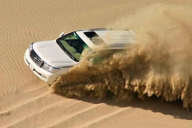 Doha: Half Day Desert Safari with Camel Ride and Inland Sea Tour - Tea and camels at Sealine Beach