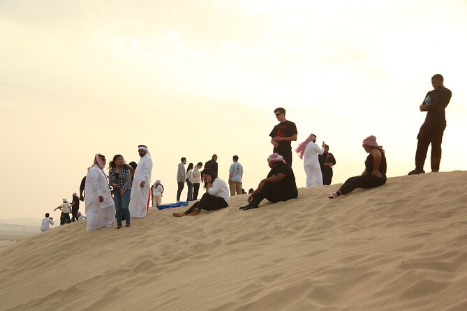 Doha: Half Day Desert Safari with Camel Ride and Inland Sea Tour - Sandboarding for a simple burst of fun