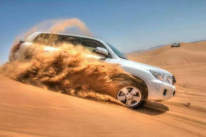 Doha Half Day Desert Safari with Camel Ride and Sand Boarding - Sandboarding for First-Timers