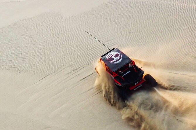 Doha-Half Day Safari with Quad Bike ATV/Camel Ride/sandboard - Sandboarding without a complicated learning curve