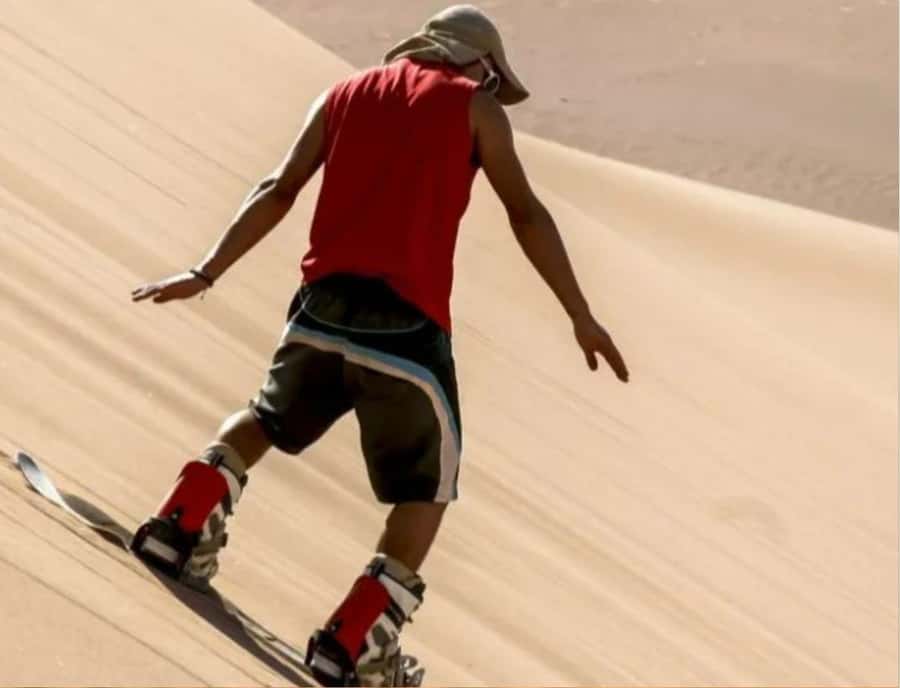 Doha : Inland Sea Desert Safari ,Camel Ride & Sandboarding - Sandboarding for an easy desert challenge