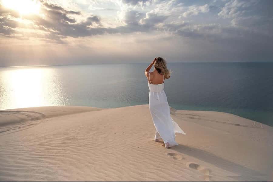 Doha: Inland Sea Desert Safari With All Activities - Camel riding adds a slower Bedouin connection