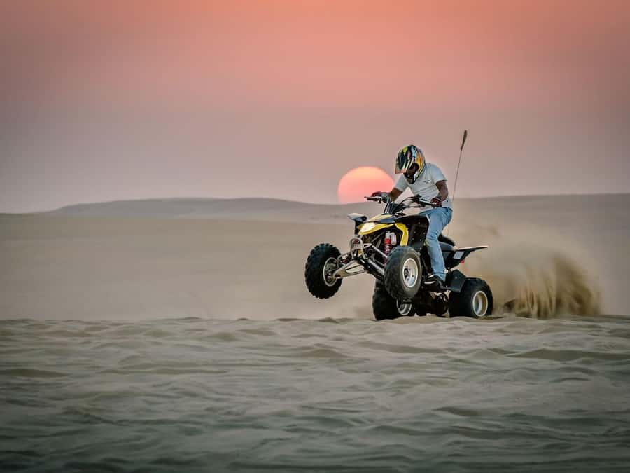 Doha: Safari, Camel Ride, Sandboarding and Inland Sea Tour - Mesaieed turns up the speed