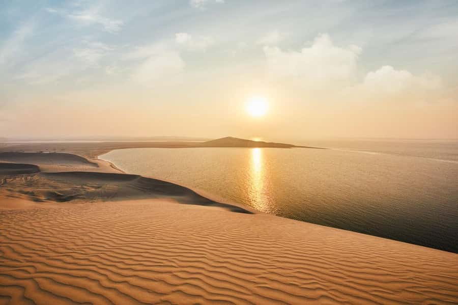 Doha:Sunrise or Sunset Desert Safari Tour with Sand Boarding - Leaving Doha for Qatar’s open desert