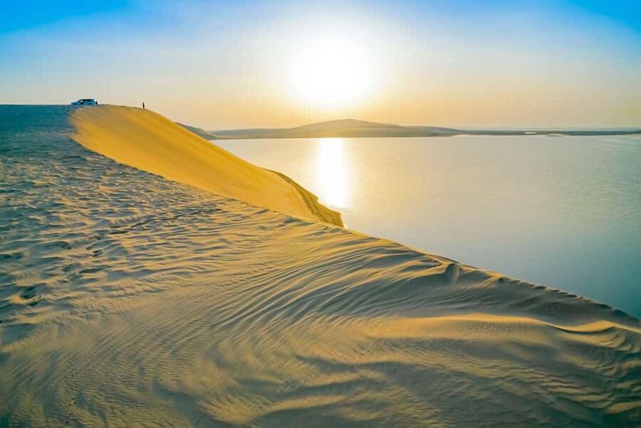 Doha: Sunset Desert Safari, ATV, Camel Ride and Sandboarding - Photography is part of the service