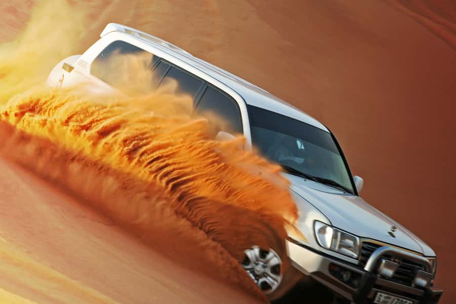 Dubai 4WD Evening Desert Safari - Dune bashing in a 4WD Land Cruiser