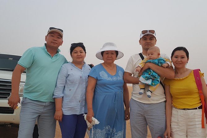 Dubai 4x4 Desert Safari, Quad Bike, Camel Ride & BBQ Dinner - Sandboarding and the sunset photo stop