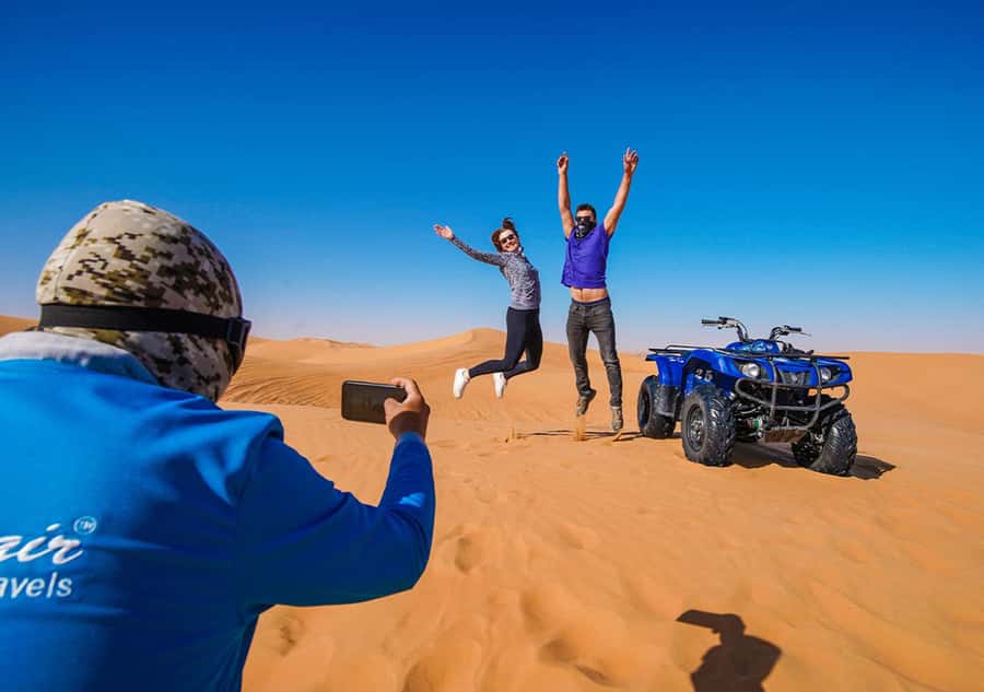 Dubai: Adventure Quad Bike Safari, Camel Ride & Refreshment - One hour across the desert dunes