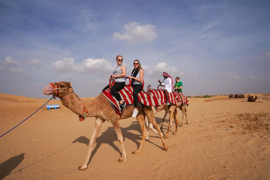 Dubai: Adventure Quad Bike Safari, Camel Ride & Refreshment - Leaving Dubai in an air-conditioned vehicle