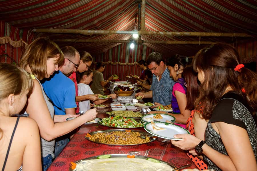 Dubai Cityscape and Desert Safari Full-Day Tour - The Bedouin-style camp after sunset